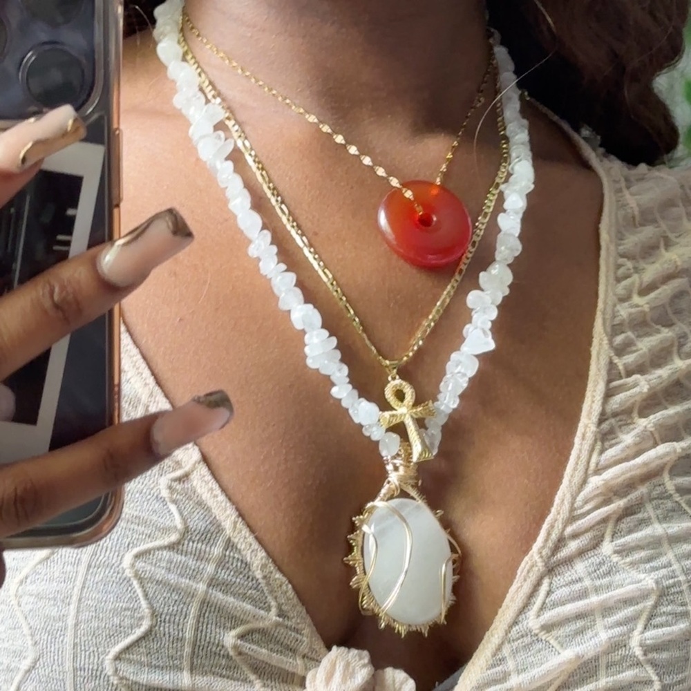 gold hand wrapped clear quartz necklace